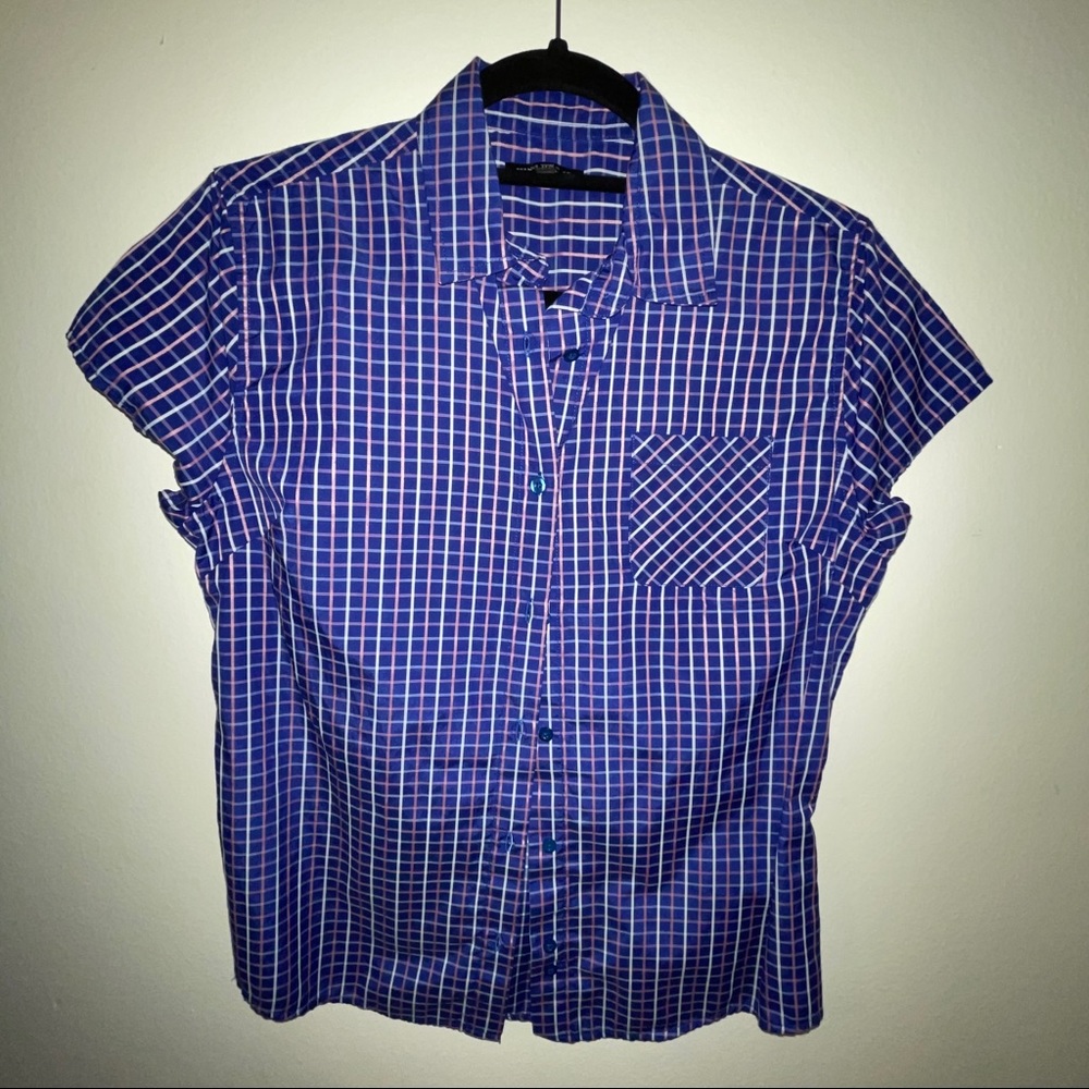 Plaid button down shirt sleeve